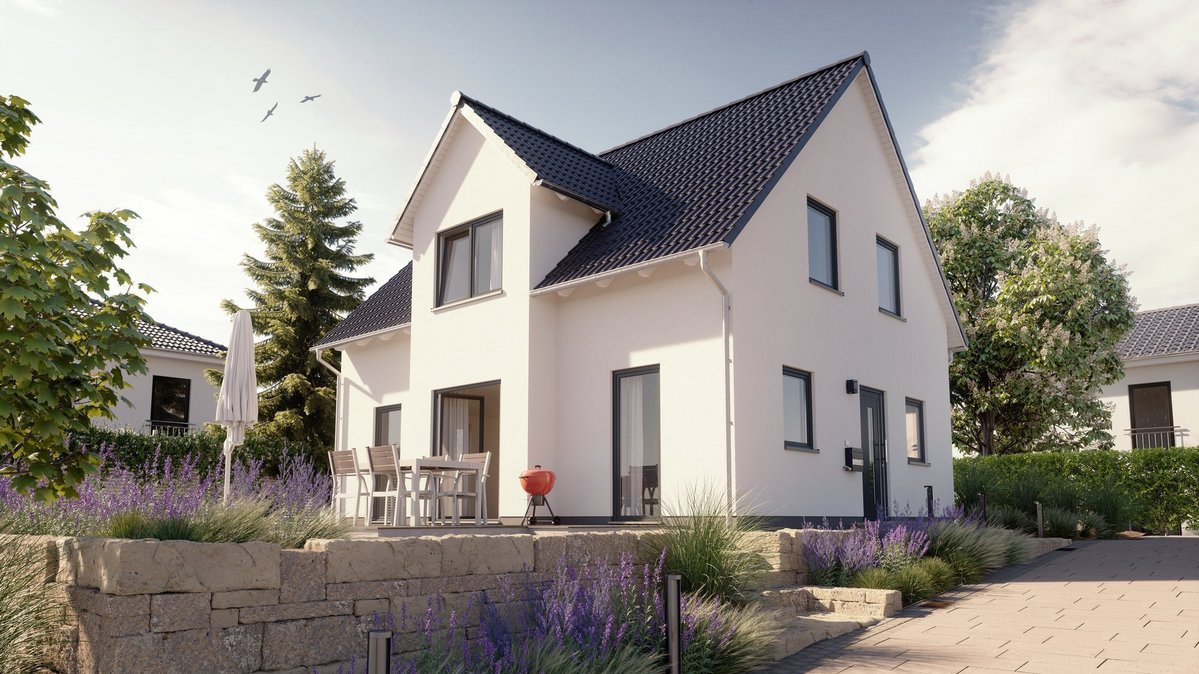 Blick auf das Lichthaus 121 in Neukirchen: Straßenseite mit Terrasse und Einfahrt im Baugebiet „Nördlich der Kirche“